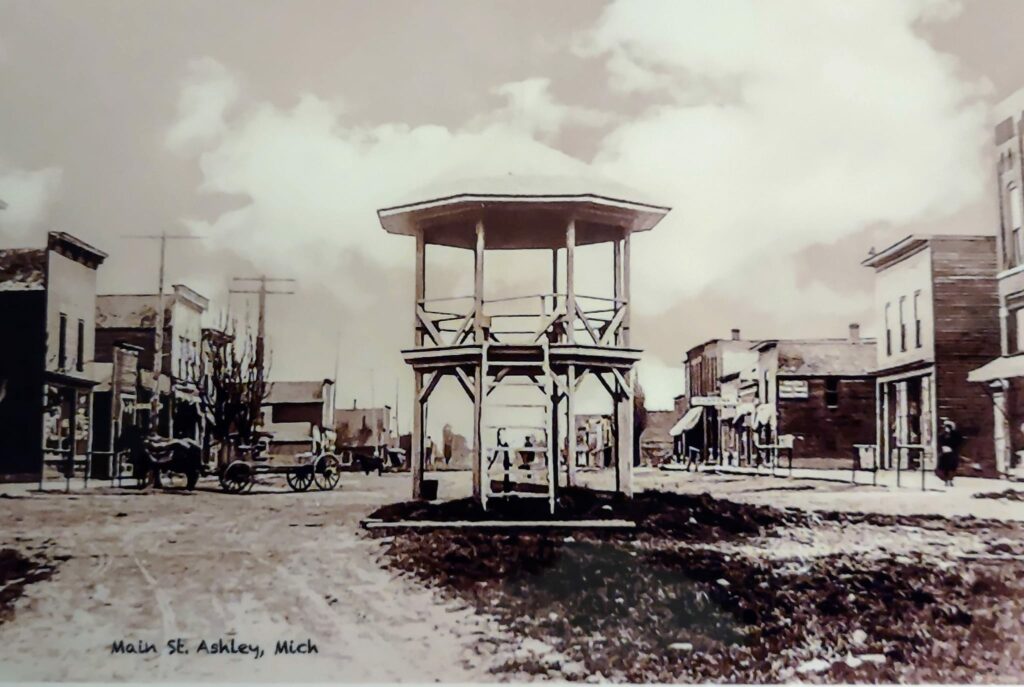 Historic Main Street, Ashley, Michigan with wooden gazebo.