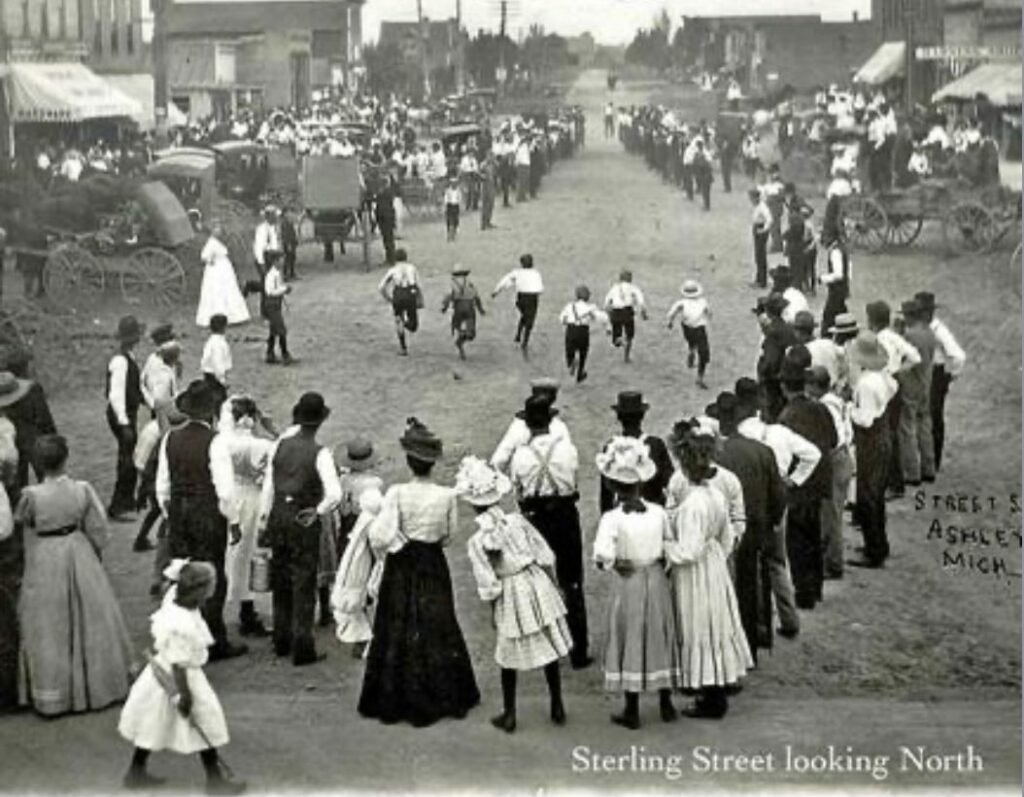 Children racing on historic Sterling Street.